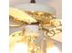 The ceiling fan has lights and gold accents at 56-1 N East Main St, Hampton, GA 30228