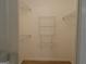 Walk-in closet features multiple shelves at 56-1 N East Main St, Hampton, GA 30228