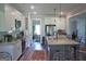 Spacious open kitchen with white cabinets, granite countertops and stainless appliances at 808 Covered Bridge Rd, Covington, GA 30016