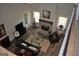 Aerial view of a cozy living room with a fireplace and open floor plan at 808 Covered Bridge Rd, Covington, GA 30016