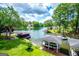 Scenic aerial view of lakefront property with boat docks and lush landscaping at 1295 Heritage Dr, Villa Rica, GA 30180