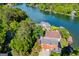 Lakefront homes featuring lush landscaping and private boat docks at 1295 Heritage Dr, Villa Rica, GA 30180