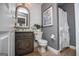 Elegant half bath with shiplap walls, stylish mirror, and modern fixtures at 1295 Heritage Dr, Villa Rica, GA 30180