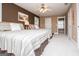 Spacious bedroom with two beds, a ceiling fan, and a warm color scheme, offering a relaxing and inviting space at 1295 Heritage Dr, Villa Rica, GA 30180
