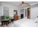 Cozy bedroom features a modern ceiling fan, dresser, and lots of natural light at 1295 Heritage Dr, Villa Rica, GA 30180