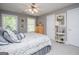 Bright bedroom featuring a neutral palette, large windows, and a comfortable bed, creating a serene atmosphere at 1295 Heritage Dr, Villa Rica, GA 30180