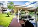 Covered boat dock with a boat, offering convenient water access and beautiful lake views, perfect for boating enthusiasts at 1295 Heritage Dr, Villa Rica, GA 30180