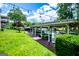 Well-maintained boat dock on a lush lawn providing direct lake access and a convenient space for water activities at 1295 Heritage Dr, Villa Rica, GA 30180