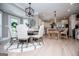 Cozy dining area adjacent to a modern kitchen, featuring stylish lighting and comfortable seating at 1295 Heritage Dr, Villa Rica, GA 30180