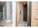 A residential elevator with light wood interior and metal accents is conveniently located for easy access throughout the home at 1295 Heritage Dr, Villa Rica, GA 30180