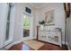 Inviting entryway featuring stylish decor, a wooden floor, and natural light at 1295 Heritage Dr, Villa Rica, GA 30180
