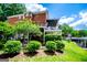 Backyard view of a charming home with tiered decks, ideal for outdoor relaxation and enjoying scenic lake views at 1295 Heritage Dr, Villa Rica, GA 30180