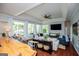 Well-lit living room with a view, bar seating, and comfortable stylish couches at 1295 Heritage Dr, Villa Rica, GA 30180