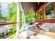 Inviting porch with lake views and stylish outdoor furniture at 1295 Heritage Dr, Villa Rica, GA 30180