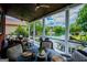 Covered porch offering serene lake views and outdoor seating at 1295 Heritage Dr, Villa Rica, GA 30180