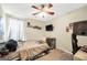 Comfortable bedroom with a ceiling fan, closet, and natural light at 502 Gallantry Trl, Mcdonough, GA 30252