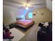 Cozy bedroom with sloped ceilings, natural light, and comfortable furnishings at 110 Kari Glen Way, Fayetteville, GA 30215