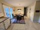 Dining area with door to the backyard and a cozy spot for Gathering meals at 110 Kari Glen Way, Fayetteville, GA 30215