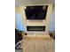 Modern fireplace with an electric insert and unfinished woodwork at 110 Kari Glen Way, Fayetteville, GA 30215