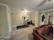 Spacious living room with plush carpeting and a comfortable leather sofa at 110 Kari Glen Way, Fayetteville, GA 30215