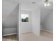 Bright bedroom featuring a window, closet with a wooden bar and neutral carpet at 105 Birch Creek Cir, Mcdonough, GA 30253