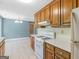 Spacious kitchen with updated appliances and seamlessly connected dining area at 105 Birch Creek Cir, Mcdonough, GA 30253