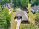 Aerial view of the home showcasing the well-maintained yard, landscaping and neighborhood at 570 Mcgarity Dr, Mcdonough, GA 30252