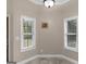 Bright breakfast nook with lots of natural light pouring through surrounding windows at 570 Mcgarity Dr, Mcdonough, GA 30252