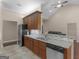 Modern kitchen features granite countertops, stainless steel appliances, and dark wood cabinetry at 570 Mcgarity Dr, Mcdonough, GA 30252