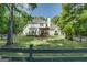 Spacious backyard with deck and white fencing at 857 Cooper Rd, Social Circle, GA 30025