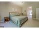 Bedroom boasts a large window and a calming, neutral color palette at 857 Cooper Rd, Social Circle, GA 30025