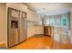 Modern kitchen with stainless steel appliances and ample cabinet space at 857 Cooper Rd, Social Circle, GA 30025