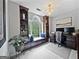 Cozy study with bookshelves, window seat, and built-in cabinets at 715 Frog Rd, Locust Grove, GA 30248