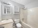 Bathroom featuring a tub, toilet, and vanity at 401 Grove Pointe Ct, Locust Grove, GA 30248