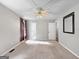 Spacious bedroom features neutral paint, carpet floors and ample closet space at 401 Grove Pointe Ct, Locust Grove, GA 30248