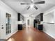 Modern kitchen featuring sleek black cabinets and stainless steel appliances at 401 Grove Pointe Ct, Locust Grove, GA 30248