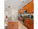 Bright kitchen featuring a large island, modern appliances, and ample cabinet space at 5237 Halcyon Ct, Morrow, GA 30260