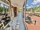 Screened-in porch with comfortable seating area, offering seamless indoor-outdoor living and views of the yard at 382 Knox Chapel Rd, Social Circle, GA 30025