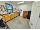 Functional workshop featuring ample storage, a workbench, and natural light for various projects and hobbies at 382 Knox Chapel Rd, Social Circle, GA 30025