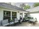 Cozy deck space featuring comfortable outdoor seating and serene surroundings at 3180 Sweetbriar Dr, Villa Rica, GA 30180