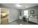 Bright bedroom featuring neutral walls, plush carpet, and lots of natural light at 3180 Sweetbriar Dr, Villa Rica, GA 30180
