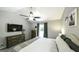 Primary bedroom features a vaulted ceiling, ceiling fan, and ensuite bathroom at 3180 Sweetbriar Dr, Villa Rica, GA 30180