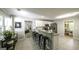 Bright kitchen featuring stainless steel appliances, granite countertops, and white cabinetry at 3180 Sweetbriar Dr, Villa Rica, GA 30180