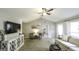 Bright living room with vaulted ceiling, stylish decor, and access to outdoor space at 3180 Sweetbriar Dr, Villa Rica, GA 30180