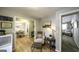 A view of living area with hardwood floors and access to the dining room at 3180 Sweetbriar Dr, Villa Rica, GA 30180