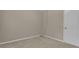 This bedroom features neutral paint and baseboard trim at 1341 Huey Rd, Douglasville, GA 30134