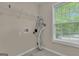 Functional laundry area with a window and space for appliances at 1341 Huey Rd, Douglasville, GA 30134