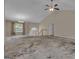Large living space featuring a staircase and a chandelier at 1341 Huey Rd, Douglasville, GA 30134