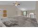 Open-concept living space with a view of staircase and natural light at 1341 Huey Rd, Douglasville, GA 30134