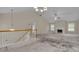 Spacious living room featuring vaulted ceilings, fireplace, and abundant natural light at 1341 Huey Rd, Douglasville, GA 30134